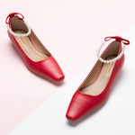Red Pearl Straps Low Heel, a bold and stylish choice for making a confident and vibrant statement