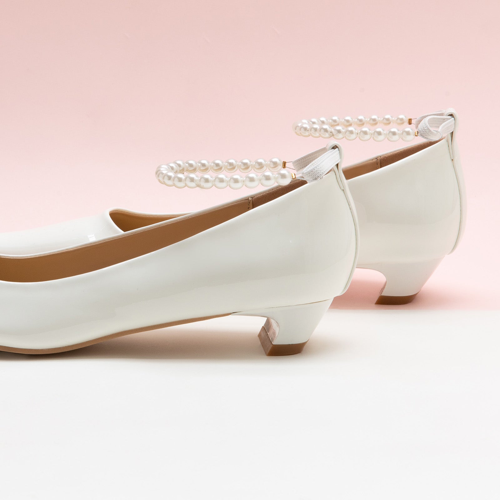 Winter Wonderland: Pearl Straps Low Heel in White, featuring delicate pearl details for a classic and refined style