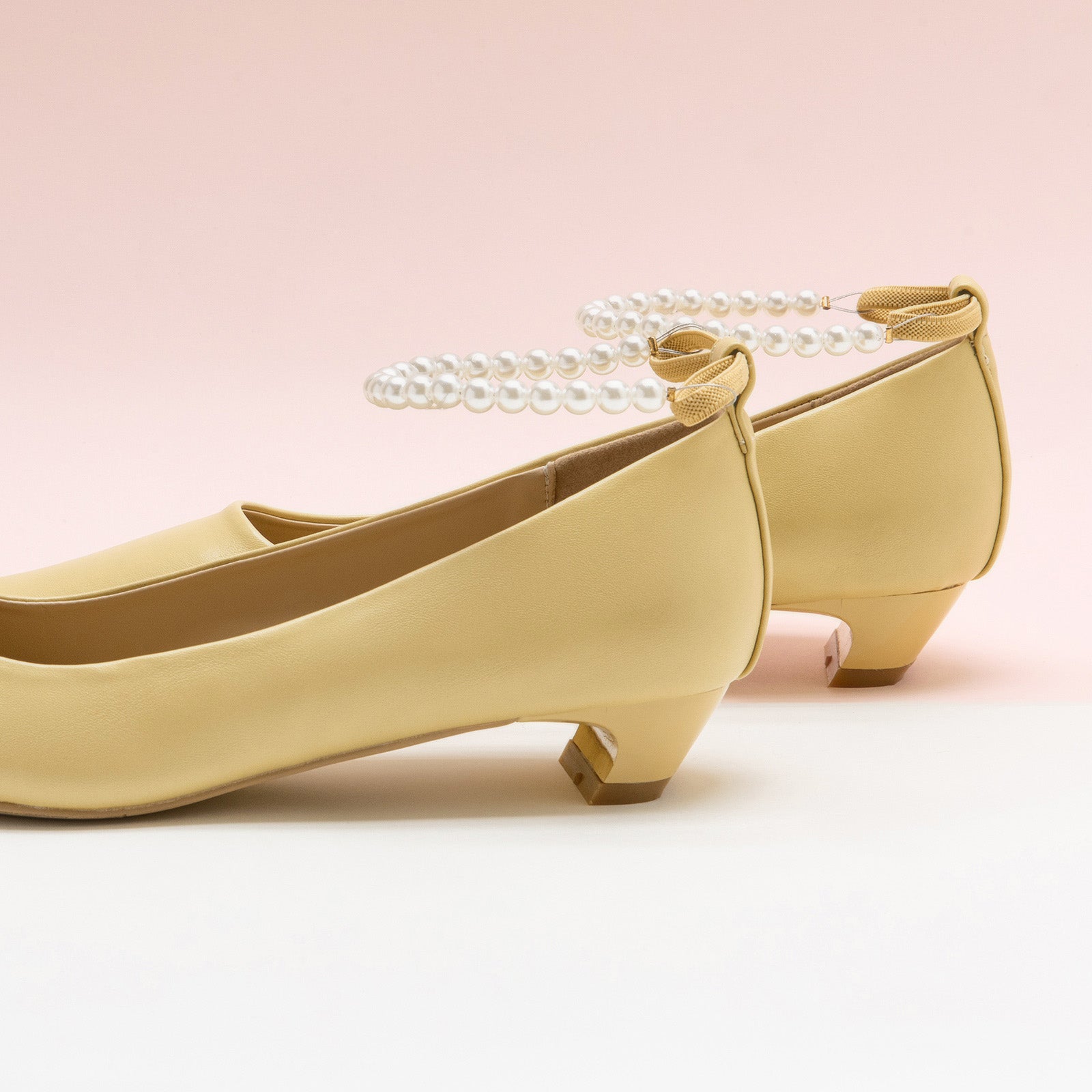 Pearl Straps Low Heel in Yellow, featuring delicate pearl details for a polished and radiant style