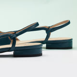Blue Pointe Toe Flats with a slingback, perfect for a confident and fashionable look in any urban setting.