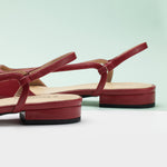 Red Pointe Toe Flats with a slingback, a confident and eye-catching addition to your footwear collection