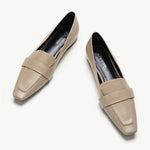 Camel platform loafers with penny strap detail.