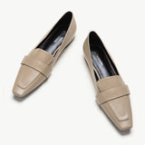Camel platform loafers with penny strap detail.