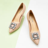 Chic-beige-leather-pumps-adorned-with-delicate-embellishments_-perfect-for-adding-a-touch-of-elegance-to-your-outfit