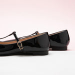 Chic-black-mary-jane-featuring-a-crossed-strap-perfect-for-a-sleek-and-polished-look.