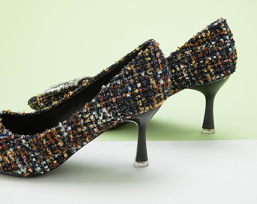 Chic-navy-blue-tweed-pumps-adorned-with-delicate-embellishments_-perfect-for-adding-a-touch-of-elegance-to-your-outfit-
