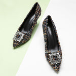 Chic-navy-blue-tweed-pumps-adorned-with-delicate-embellishments_-perfect-for-adding-a-touch-of-elegance-to-your-outfit