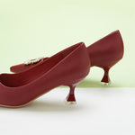 Chic-red-leather-pumps-adorned-with-intricate-embellishments_-perfect-for-making-a-statement-and-adding-flair-to-your-outfit