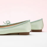    Chic-silky-light-green-ballet-flats-with-a-delightful-bowknot-accent_-adding-a-touch-of-whimsy.