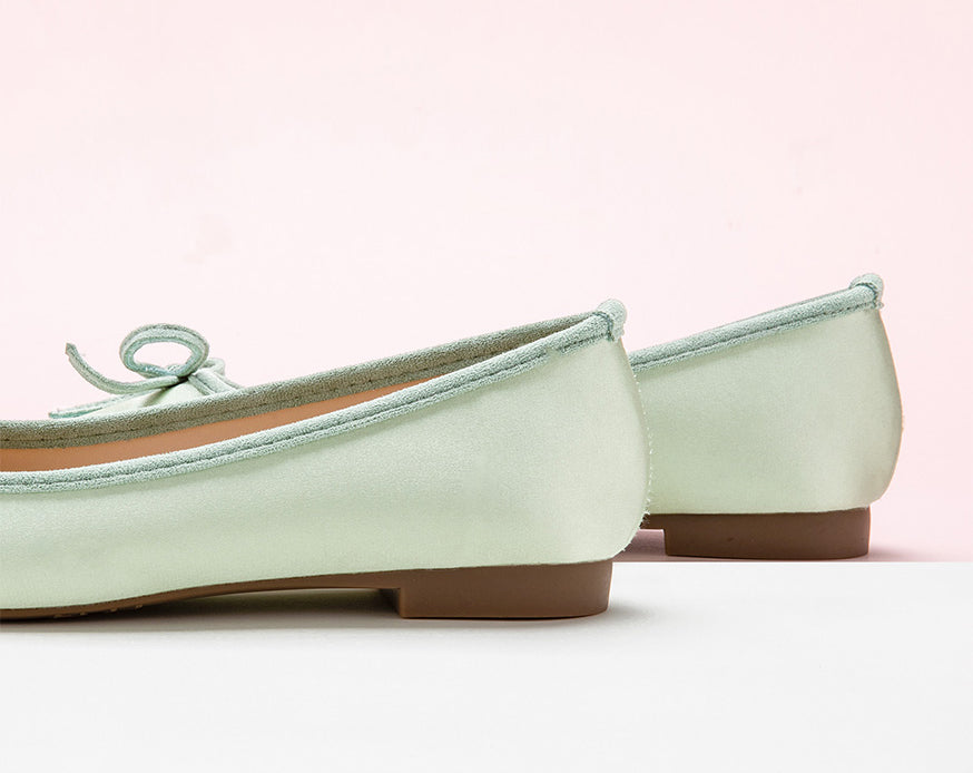    Chic-silky-light-green-ballet-flats-with-a-delightful-bowknot-accent_-adding-a-touch-of-whimsy.