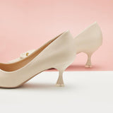 Chic-white-C-buckled-pumps_-perfect-for-a-polished-and-versatile-look