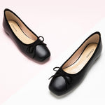 Classic-black-ballet-flats-adorned-with-a-stylish-and-dainty-bowknot