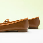 Classic-brown-ballet-flats-featuring-a-lovely-bowknot-accent-for-a-timeless-appeal