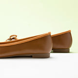 Classic-brown-ballet-flats-featuring-a-lovely-bowknot-accent-for-a-timeless-appeal
