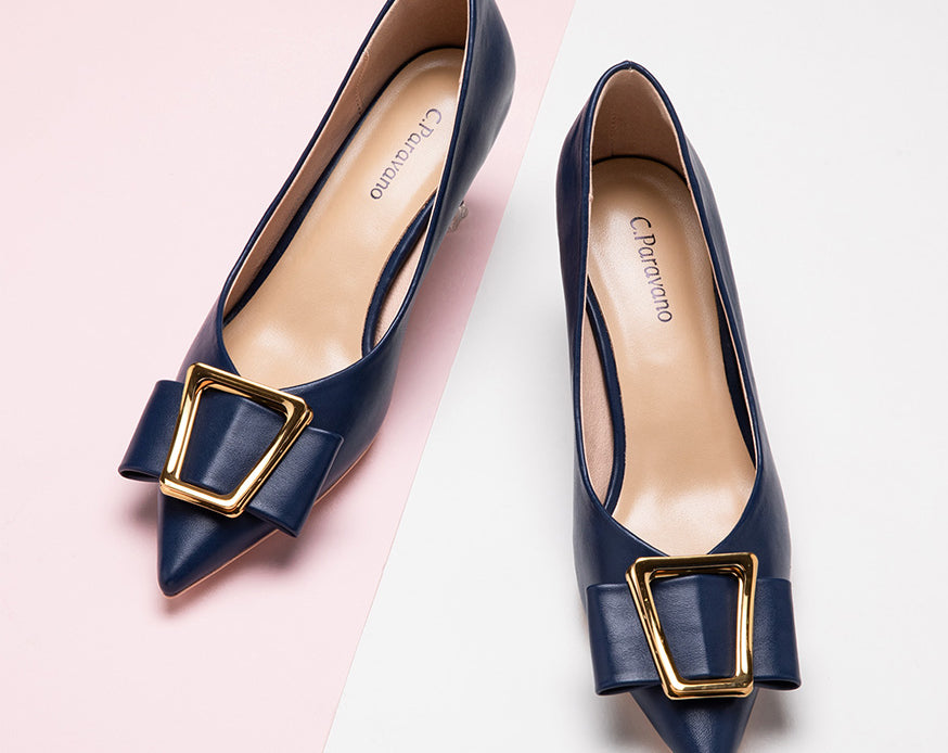    Classic-navy-high-heeled-pumps-featuring-oval-buckles
