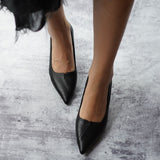  Black Convertible Pumps with a stylish kitten heel, a modern and fashionable option for city living