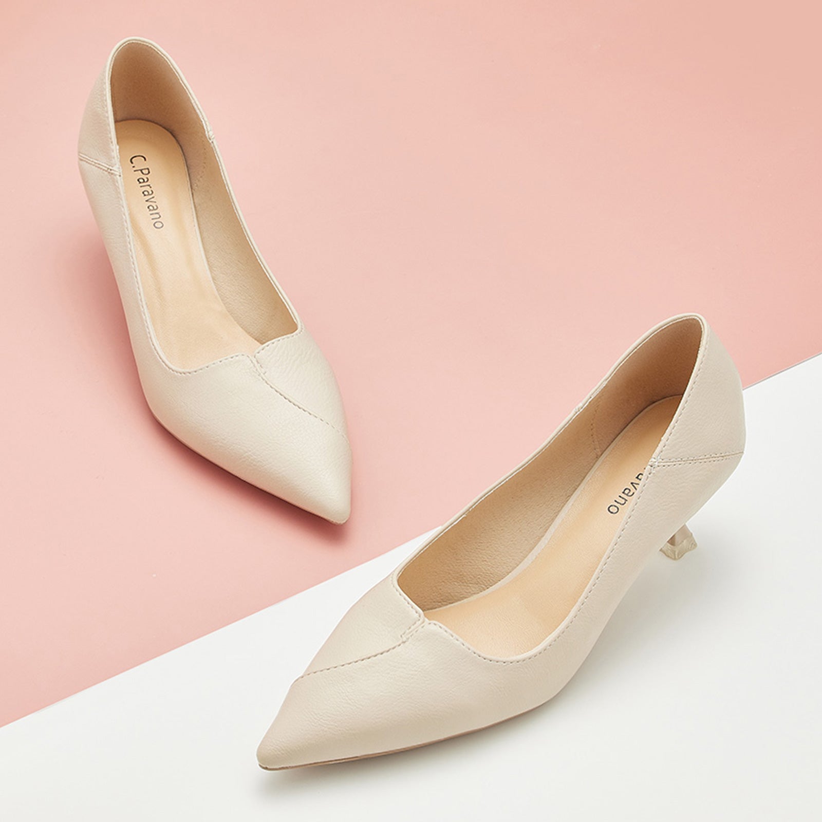 Convertible Pumps in White with a stylish kitten heel, featuring classic details for a polished and sophisticated style.