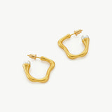 Dynamic Elegance: Large Hoop Earrings with a dynamic squiggle wavy motif,