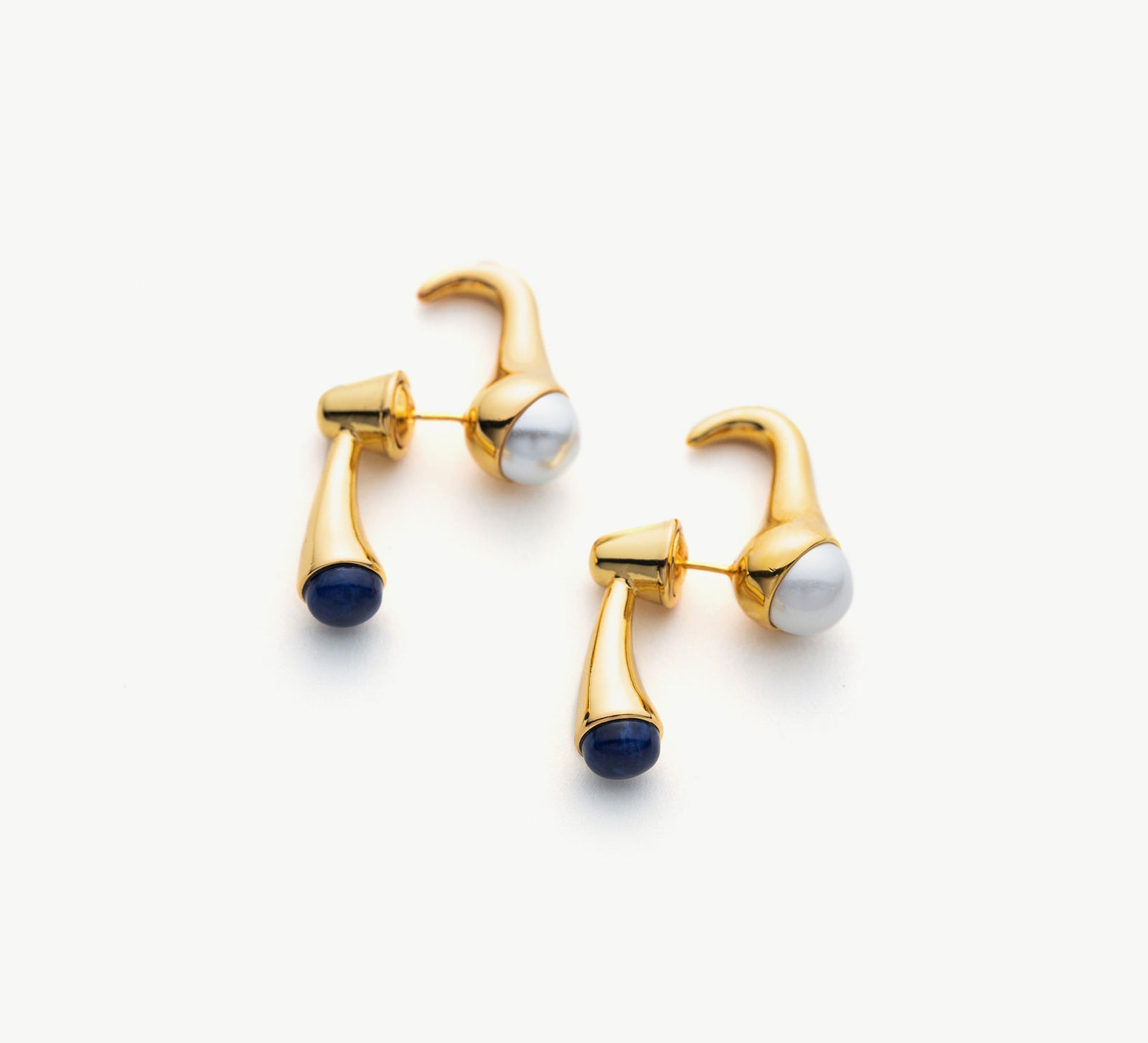 Pearl Crossover Hoop Earrings, a timeless and elegant accessory featuring lustrous pearls in a captivating crossover design for a classic look