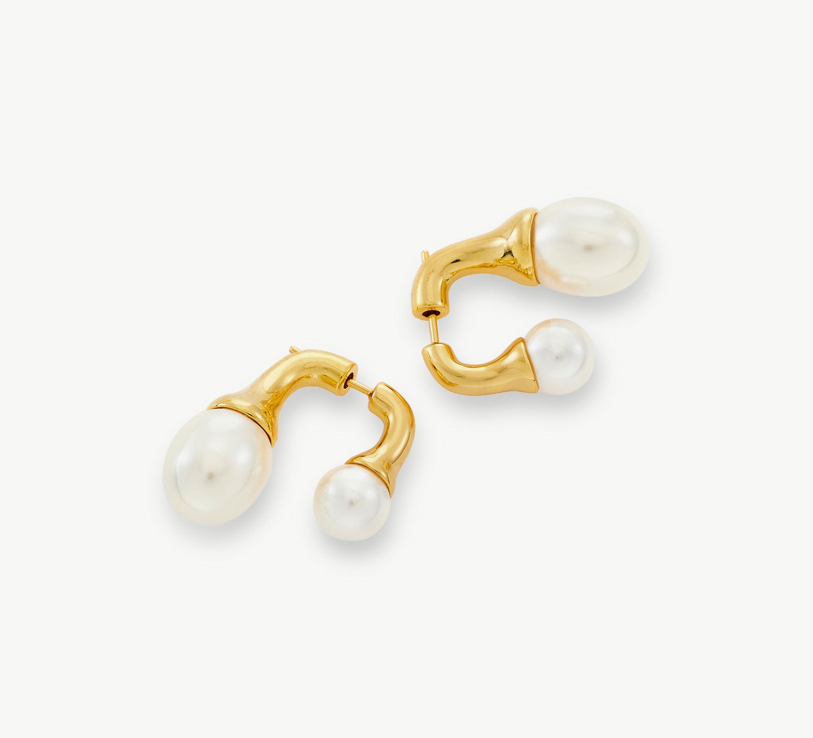 Double Pearls Earrings in Gold, a luxurious and timeless pair featuring dual pearls for an opulent and sophisticated look