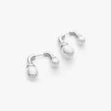 Silver Double Pearls Earrings, an effortlessly charming accessory that seamlessly complements your everyday or special occasion attire