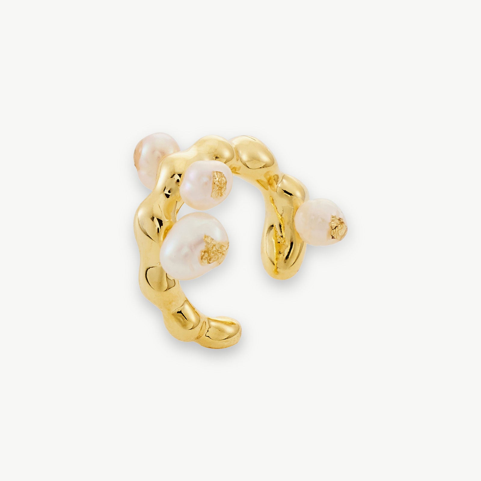 Baroque Pearl Ear Cuff in gold, a timeless and versatile accessory that effortlessly complements any ensemble.