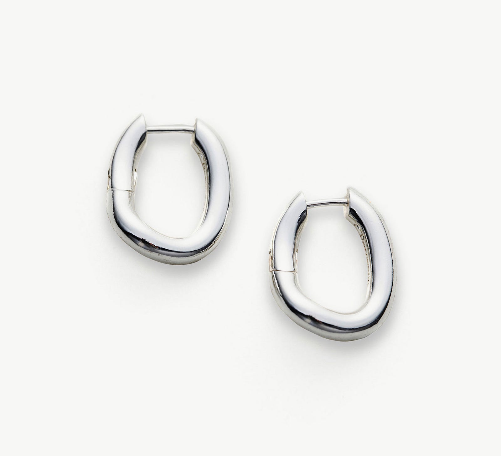 Tunnel Hoop Earrings in Silver, timeless classics that capture the enduring beauty of silver hoops, providing a versatile and stylish accessory for any look