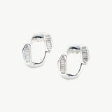 Contemporary Silver Charm: Crystal-adorned Wavy Stud Earrings in silver, a contemporary and stylish choice that complements your look with understated elegance