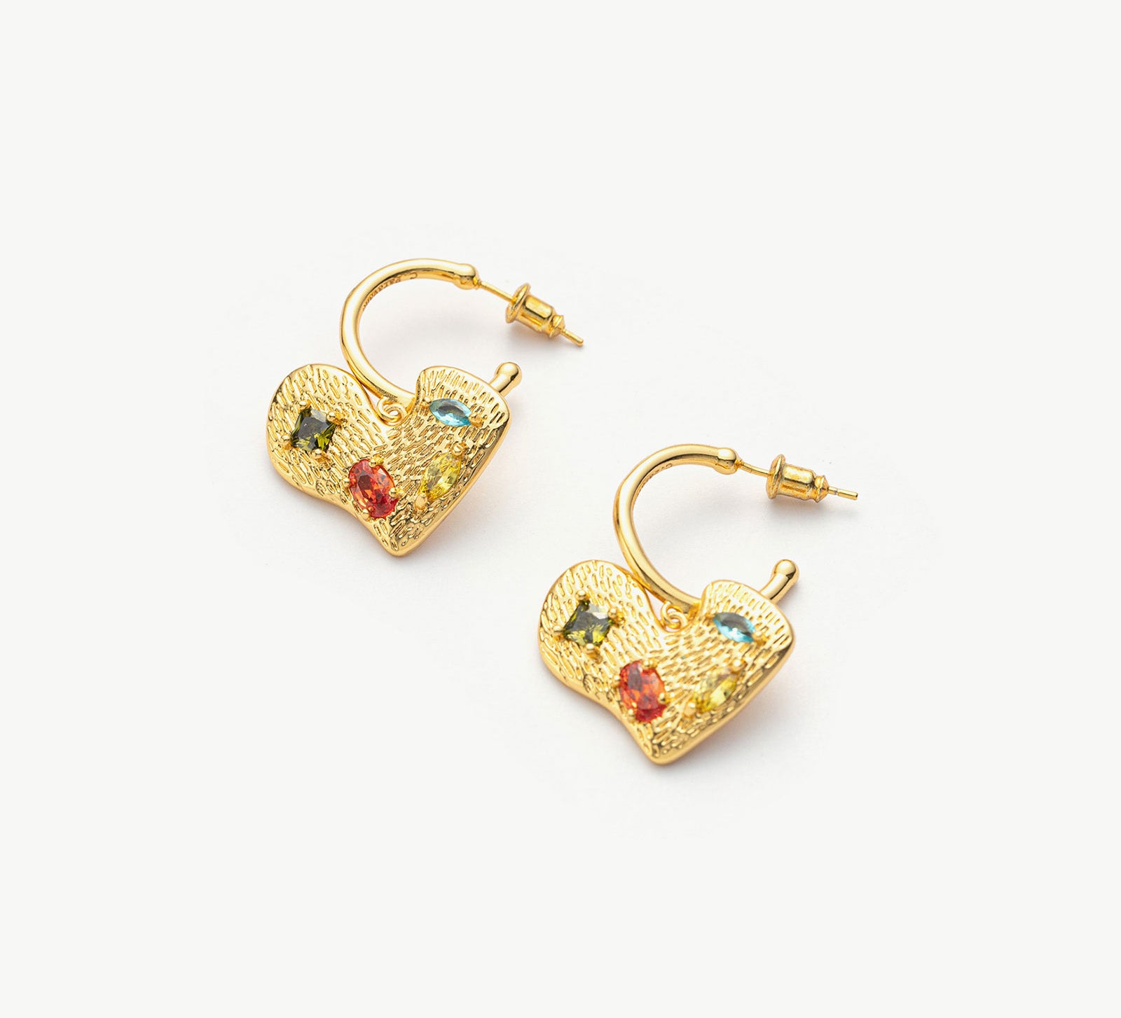 Hoop Earrings adorned with heart-shaped gemstone charms, a versatile and chic pair that effortlessly complements a range of outfits