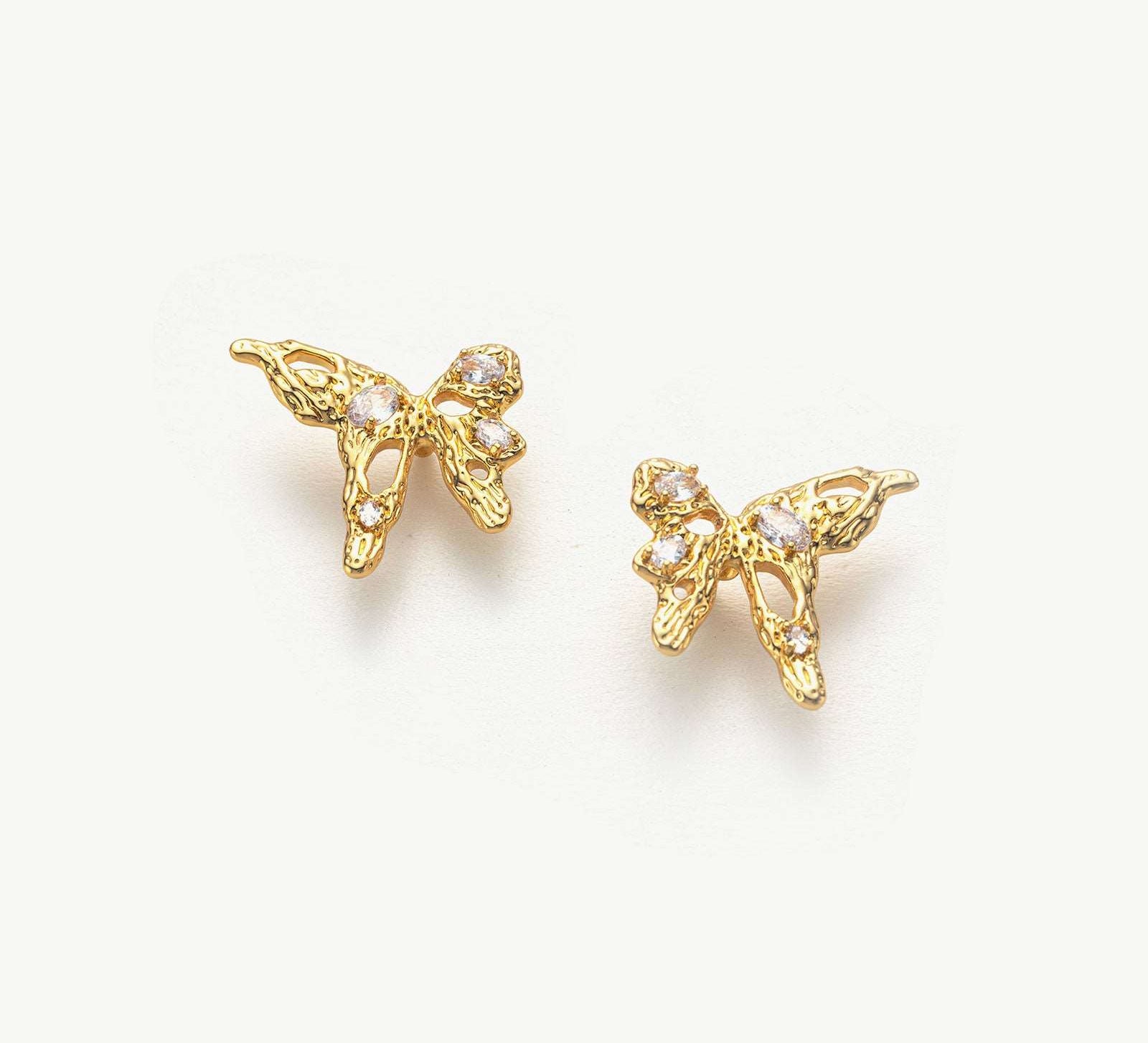Crystal Stud Earrings with Butterfly Design, a whimsical and sparkling accessory that adds a touch of enchantment to your ears.