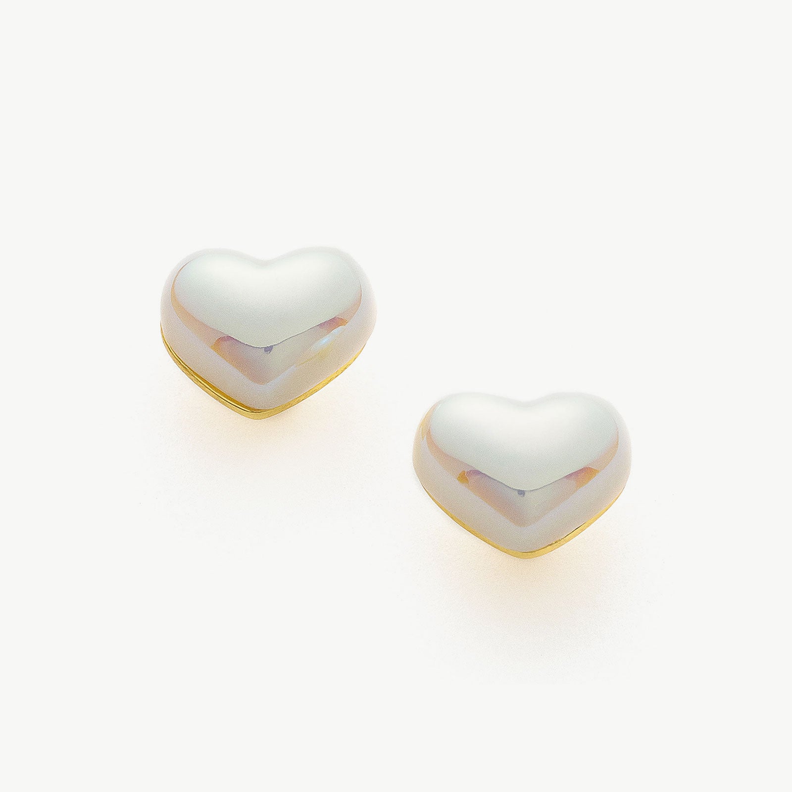  Heart-shaped Stud Earrings, a timeless symbol of love that brings a romantic and classic touch to your ensemble