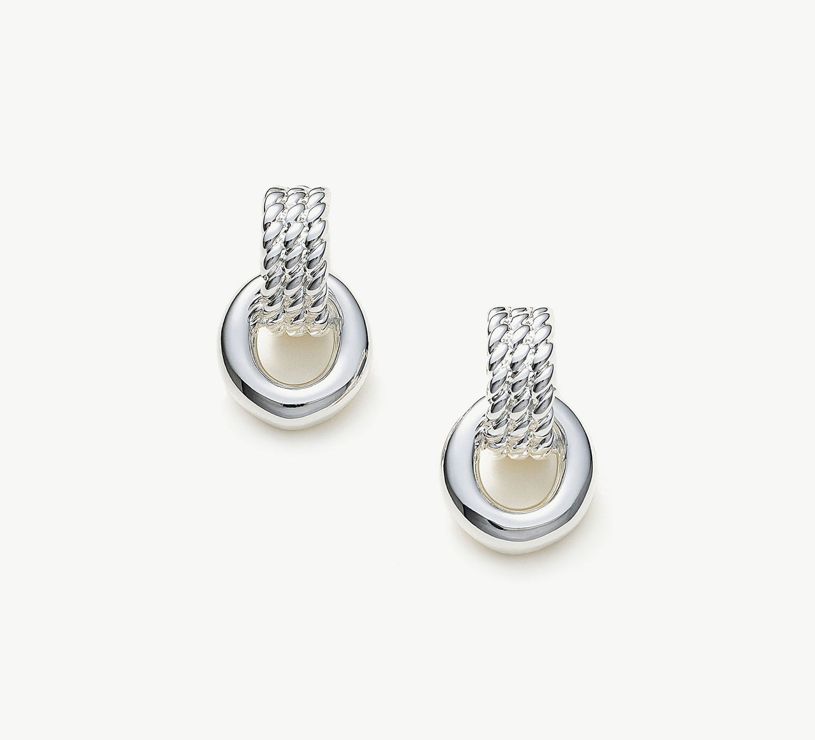 Ring Entwine Chunky Earrings in Silver, showcasing a sleek and shiny design, these earrings add a touch of modern sophistication to your ear ensemble