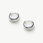  Dome Hoop Earrings in Silver, a sleek and sophisticated pair that adds a touch of modern elegance to your ears.