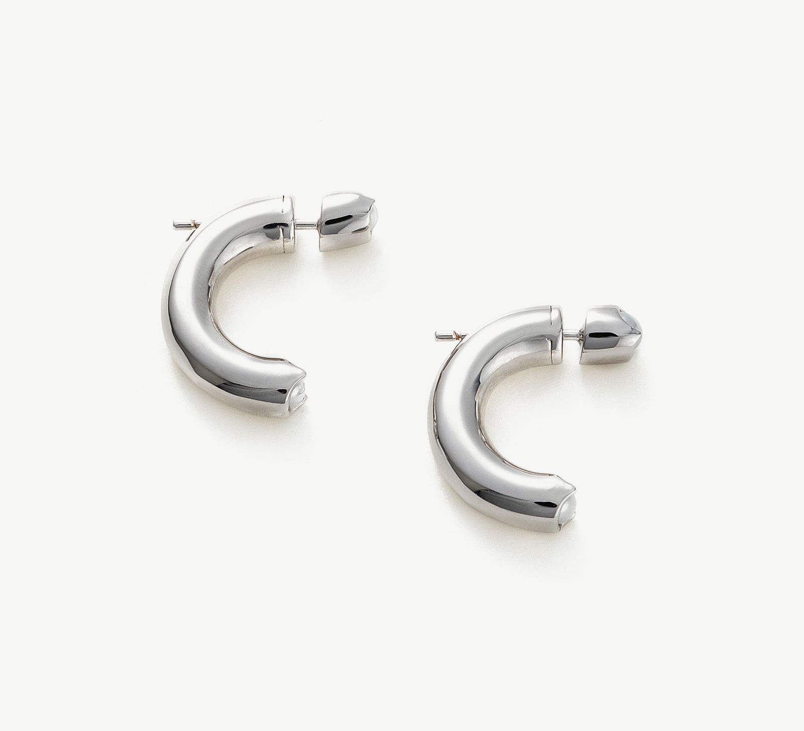 Mini Hoop Earrings in Silver, sleek and stylish, these mini hoops in silver tones offer a modern and versatile addition to your ear accessories