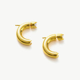 Mini Hoop Earrings in Gold, a radiant and dainty accessory that adds a touch of warmth and sophistication to your ear ensemble