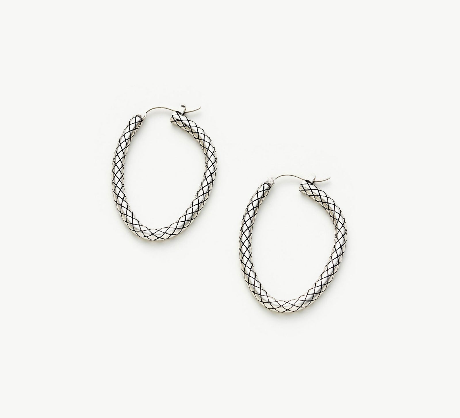 Front Facing Hoop Earrings, a chic and modern accessory designed to face forward, adding a contemporary twist to classic hoop elegance