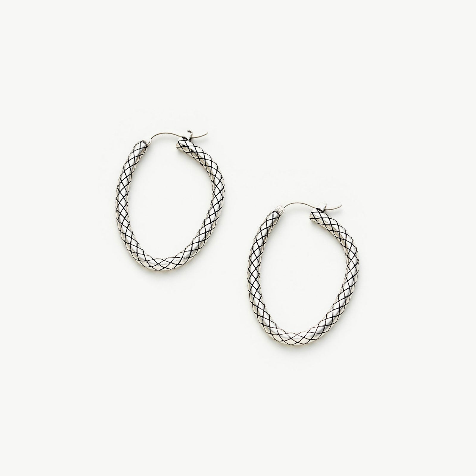 Front Facing Hoop Earrings, a chic and modern accessory designed to face forward, adding a contemporary twist to classic hoop elegance