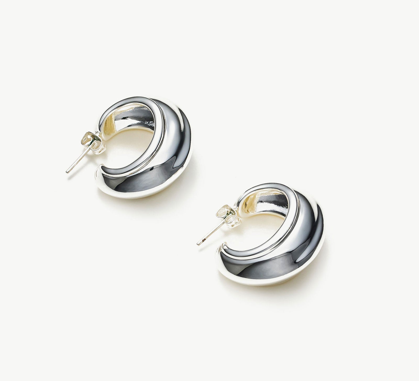 Modern Ridge Elegance: Ridge Hoop Earrings, showcasing a modern ridge design, these earrings exude elegance with a touch of contemporary flair, making them a stylish accessory for any occasion.