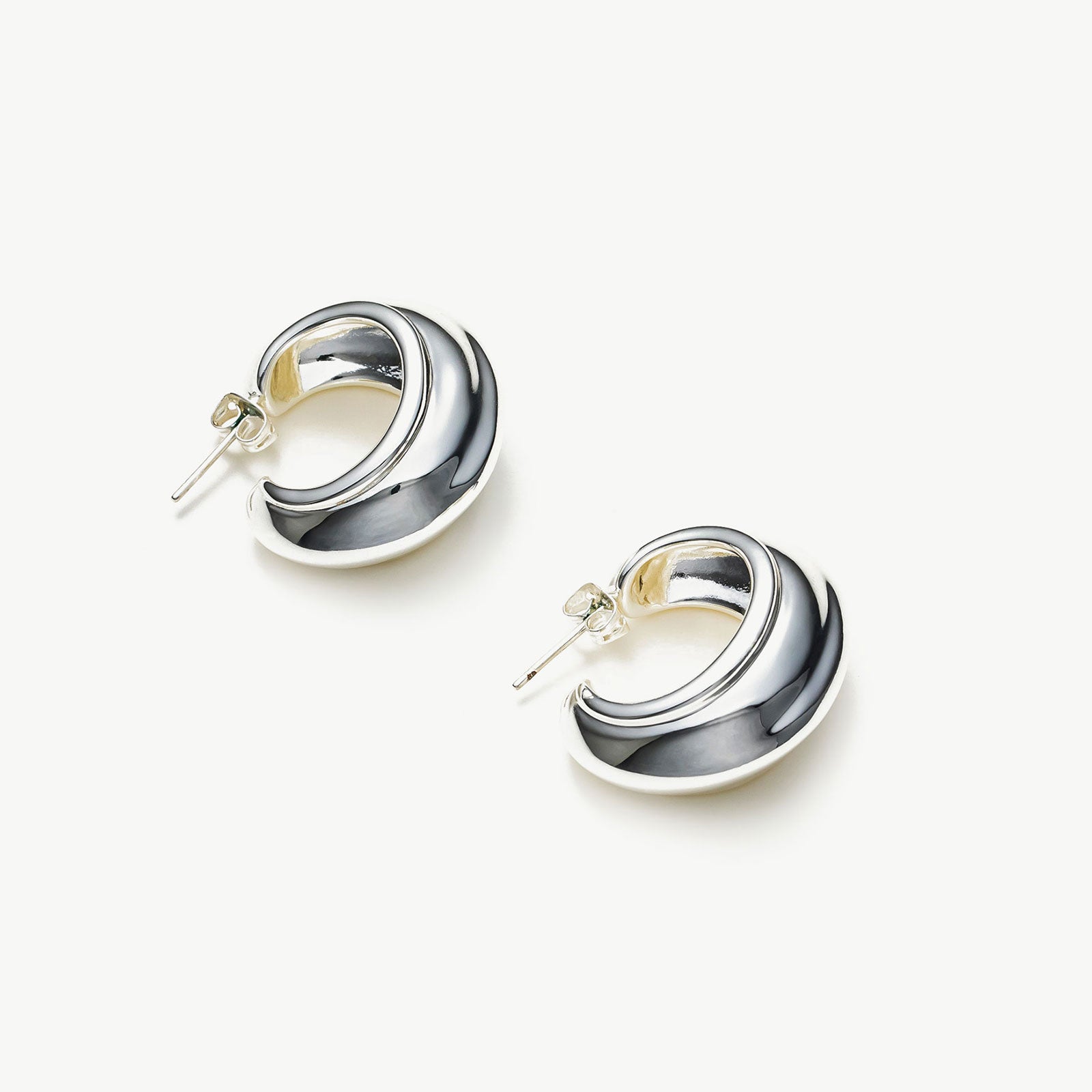 Modern Ridge Elegance: Ridge Hoop Earrings, showcasing a modern ridge design, these earrings exude elegance with a touch of contemporary flair, making them a stylish accessory for any occasion.