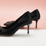City Lights Glamour: Black Elegant Pumps with a square buckle
