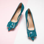 Square Buckled Pumps in Peacock Blue, a versatile and chic choice for elevating your ensemble with a pop of color.