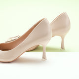 Square Buckled Pumps in White, providing a refined and understated touch to your ensemble