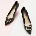  Women Pumps in Black with distinctive metal buckles, a chic and minimalist addition to your footwear collection