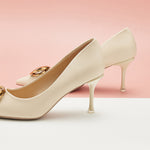 White Women Pumps with metal buckles, a chic and modern choice for everyday wear