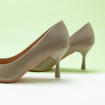 Women Pumps in Camel with stylish metal buckles, a versatile and chic option for everyday wear.