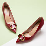 Women Pumps in Red with fashionable metal buckles, adding a touch of modernity to your ensemble in a striking color.