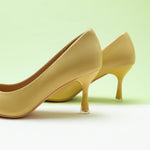 Women Pumps in Yellow with stylish metal buckles, featuring classic details for a polished and radiant style