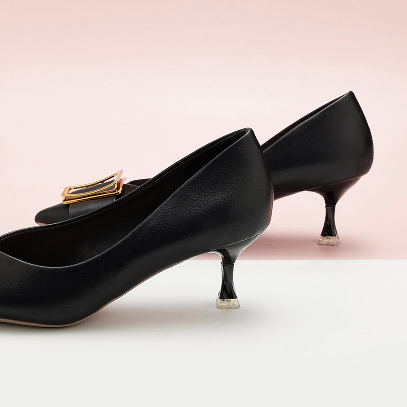 Geometric Black Kitten Heel Pumps, effortlessly blending style and comfort for any occasion.