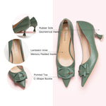 Make a chic statement with these green pumps showcasing a kitten heel and a delicate buckle, adding a touch of modern glamour to your ensemble