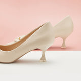 White Buckled Grain Leather Pumps: Classic and Fresh